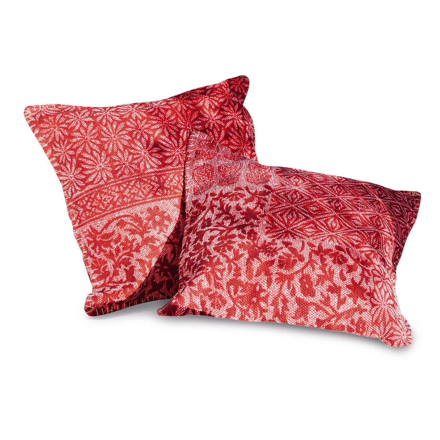 Zwei rote Baumwollkissen mit floralem und geometrischem Muster als Wohnaccessoire