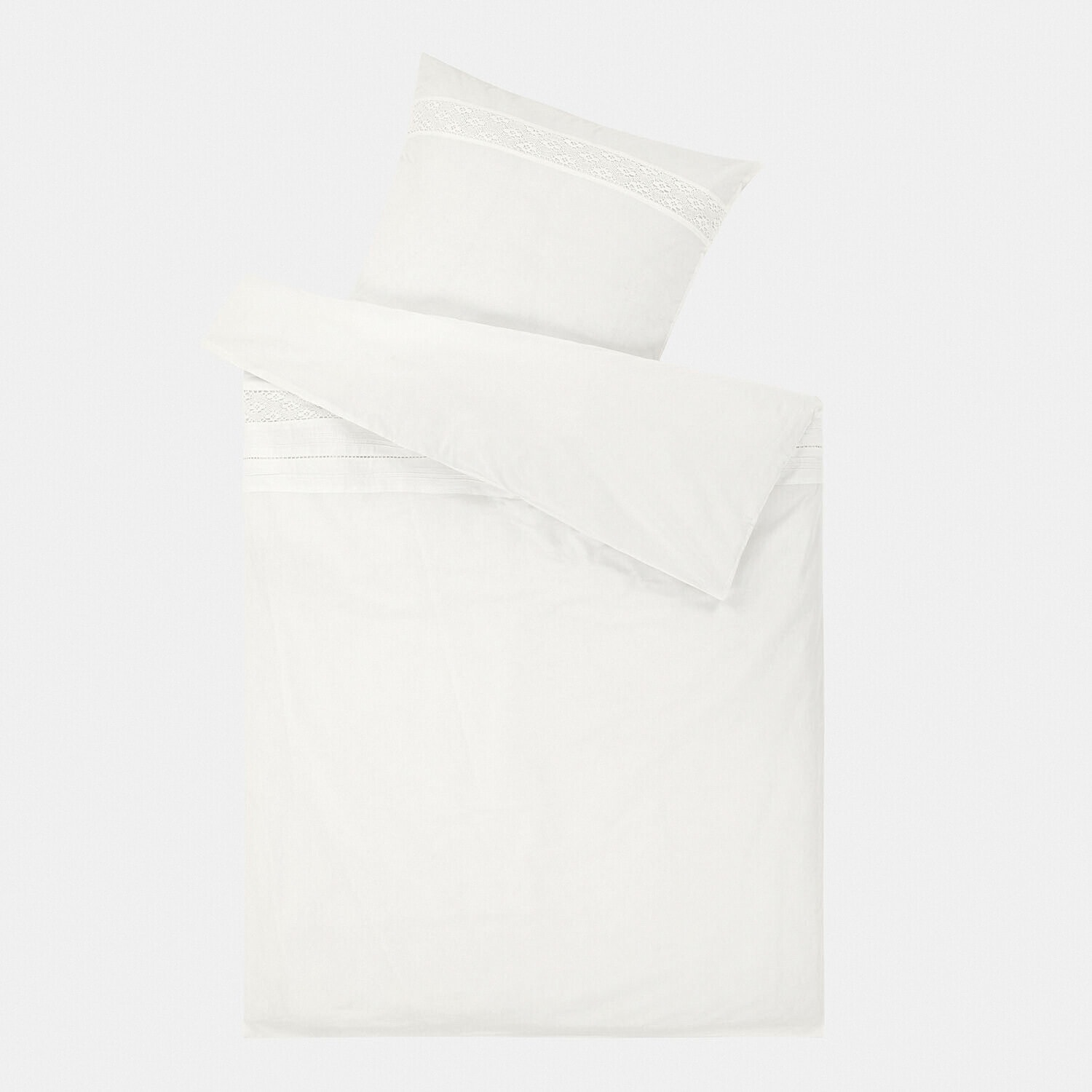 Weiße Baumwollbettwäsche mit zarter Spitze, weich und perfekt für das Schlafzimmer