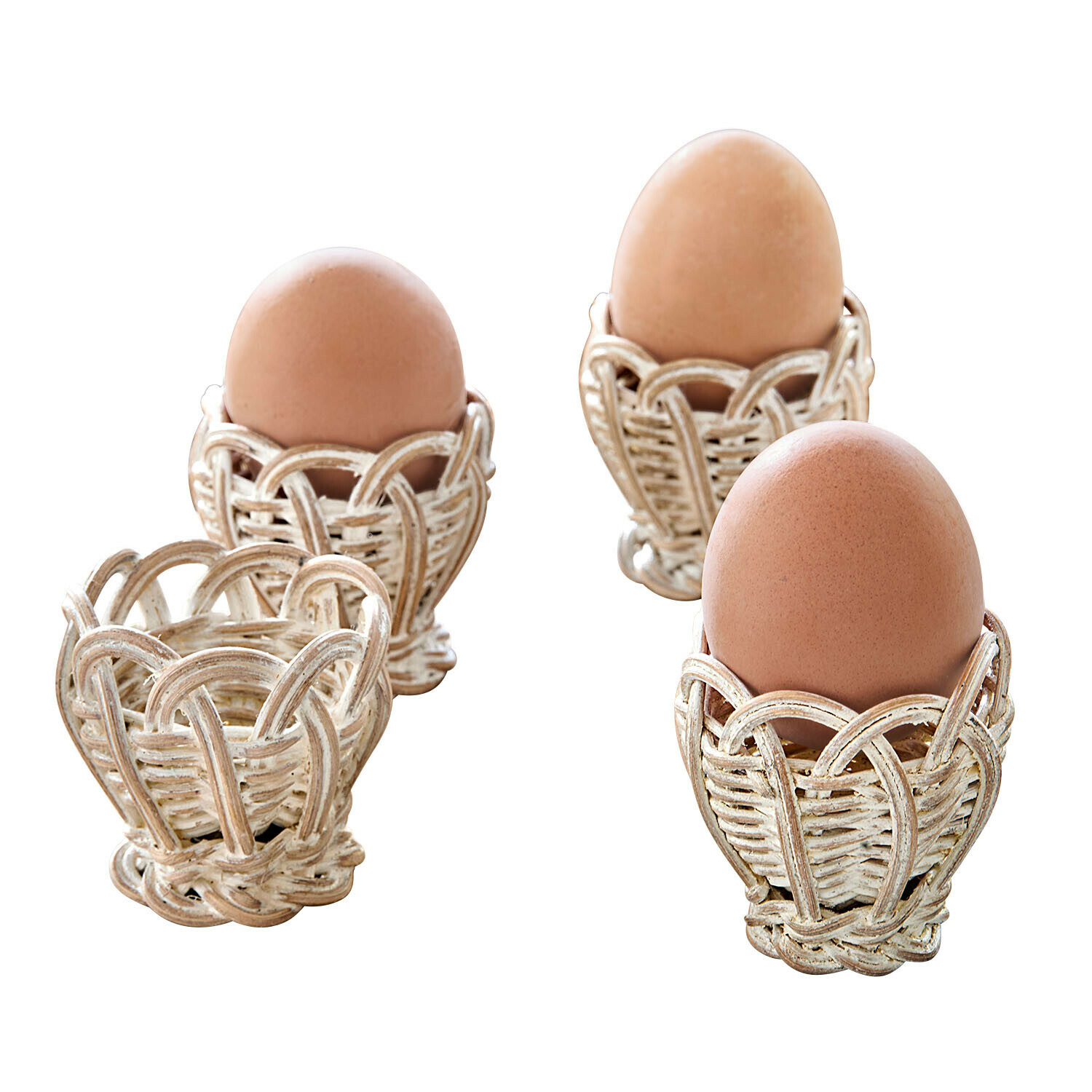 Eierbecher 4er Set Minouvelle Set weiße Rattan-Eierhalter mit braunen Natur-Eiern für ein rustikales Frühstück