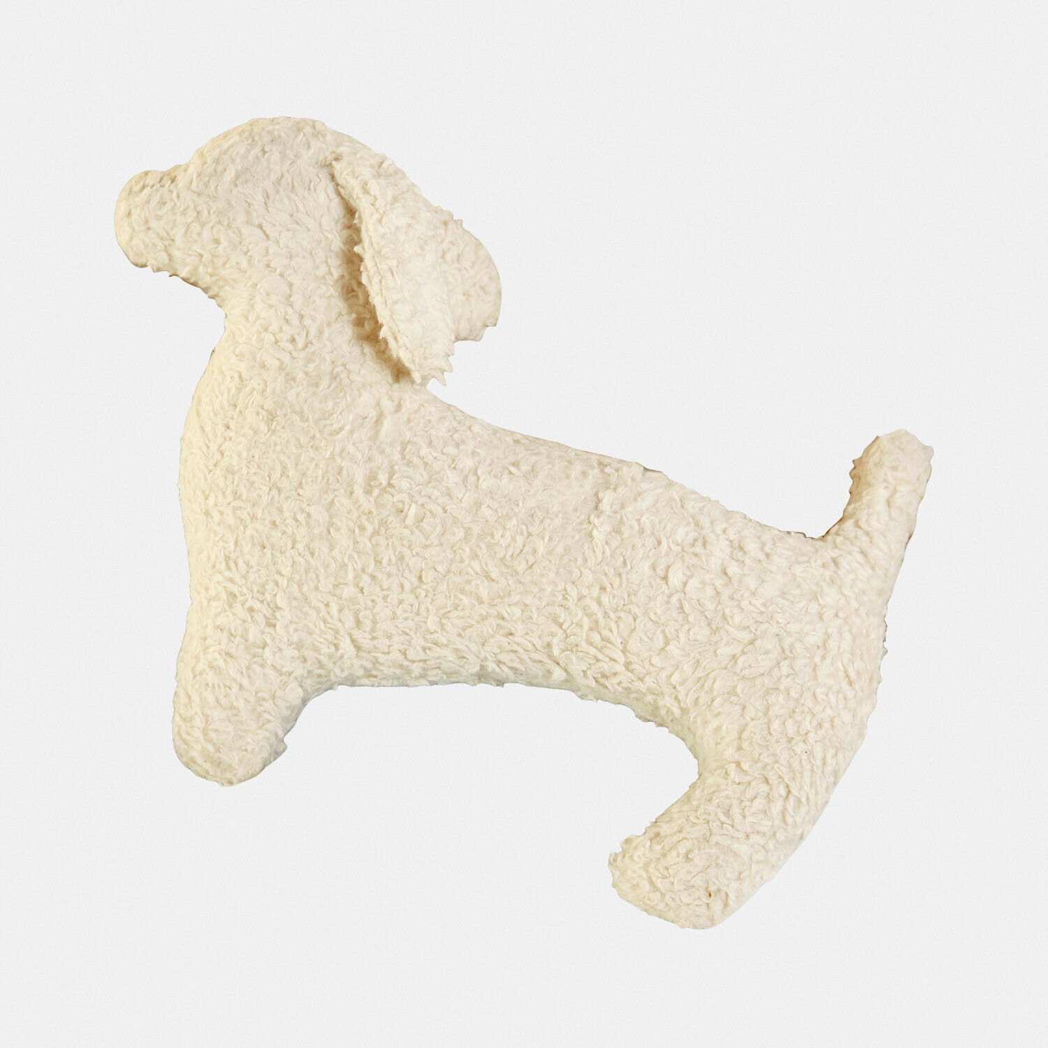 Weiches cremefarbenes Kissen in Hundeform aus Plüschstoff, Dekoration fürs Kinderzimmer