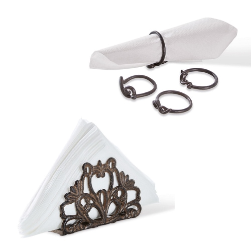 Dunkle Metall-Serviettenringe und dekorativer Serviettenhalter für weiße Servietten