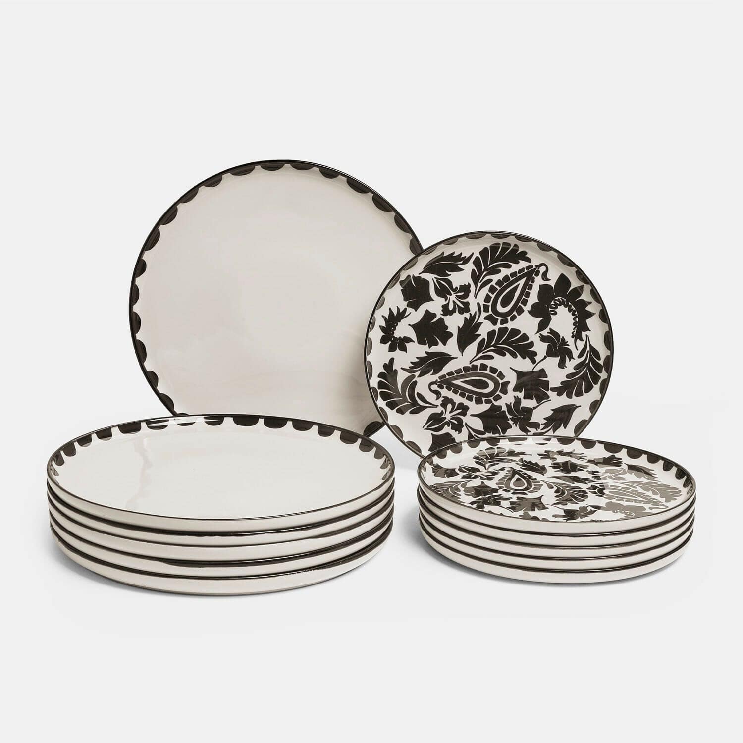 Teller 12er Set Tazira Set aus schwarzen und weißen Keramiktellern mit dekorativem Muster und glatten Rändern