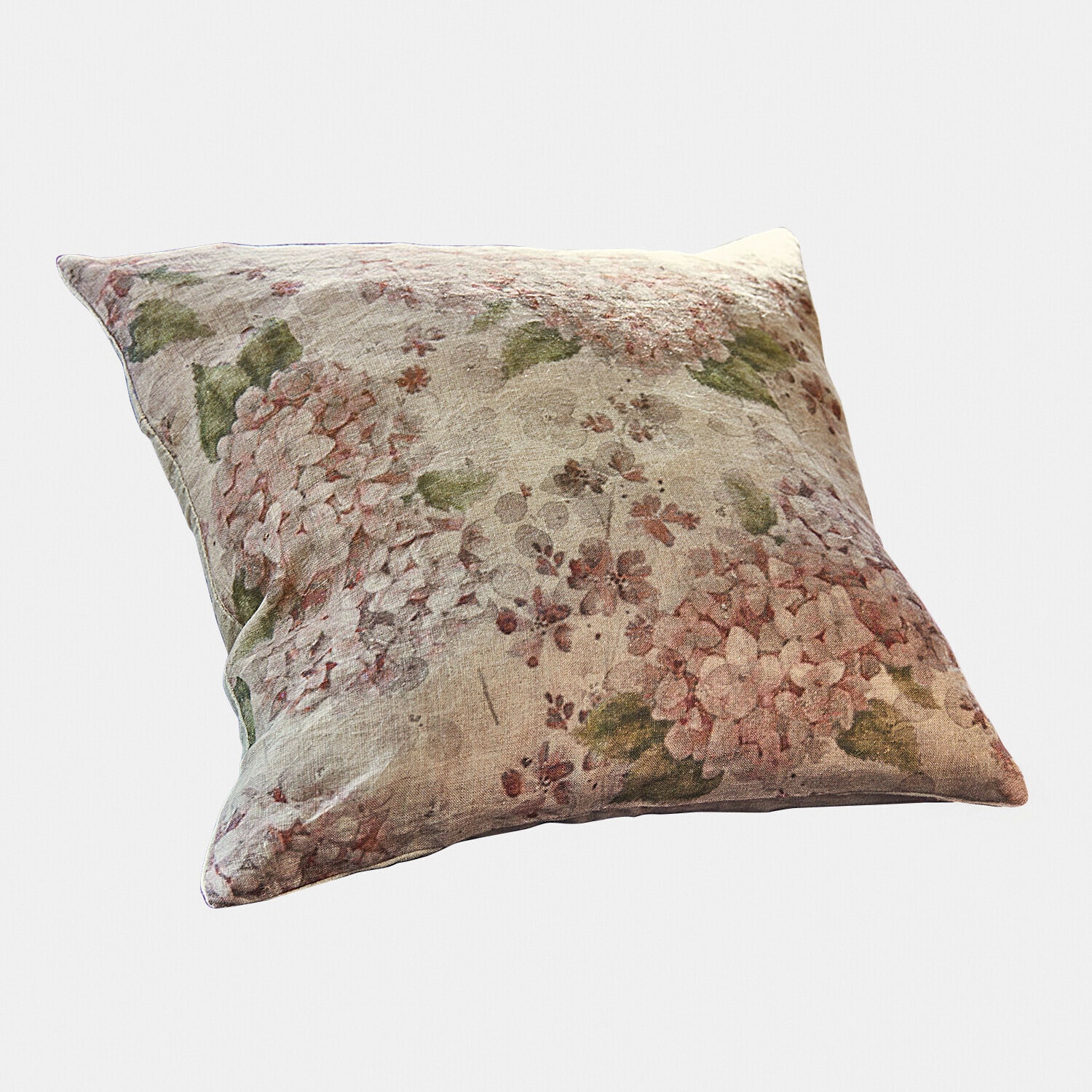 Dekoratives Leinenkissen mit floralem Muster in Rosa- und Grüntönen, weich und stilvoll