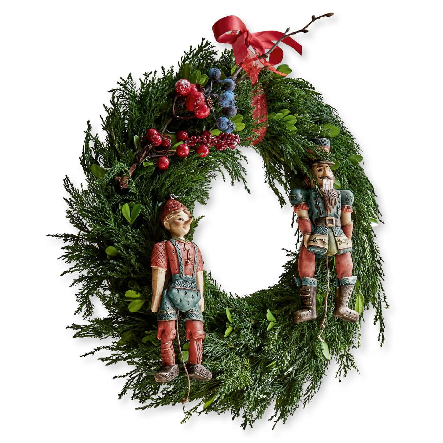 Kranz Dahab Weihnachtskranz aus grünen Zweigen mit roten und blauen Beeren, verziert mit Holzfiguren Nussknacker und Junge