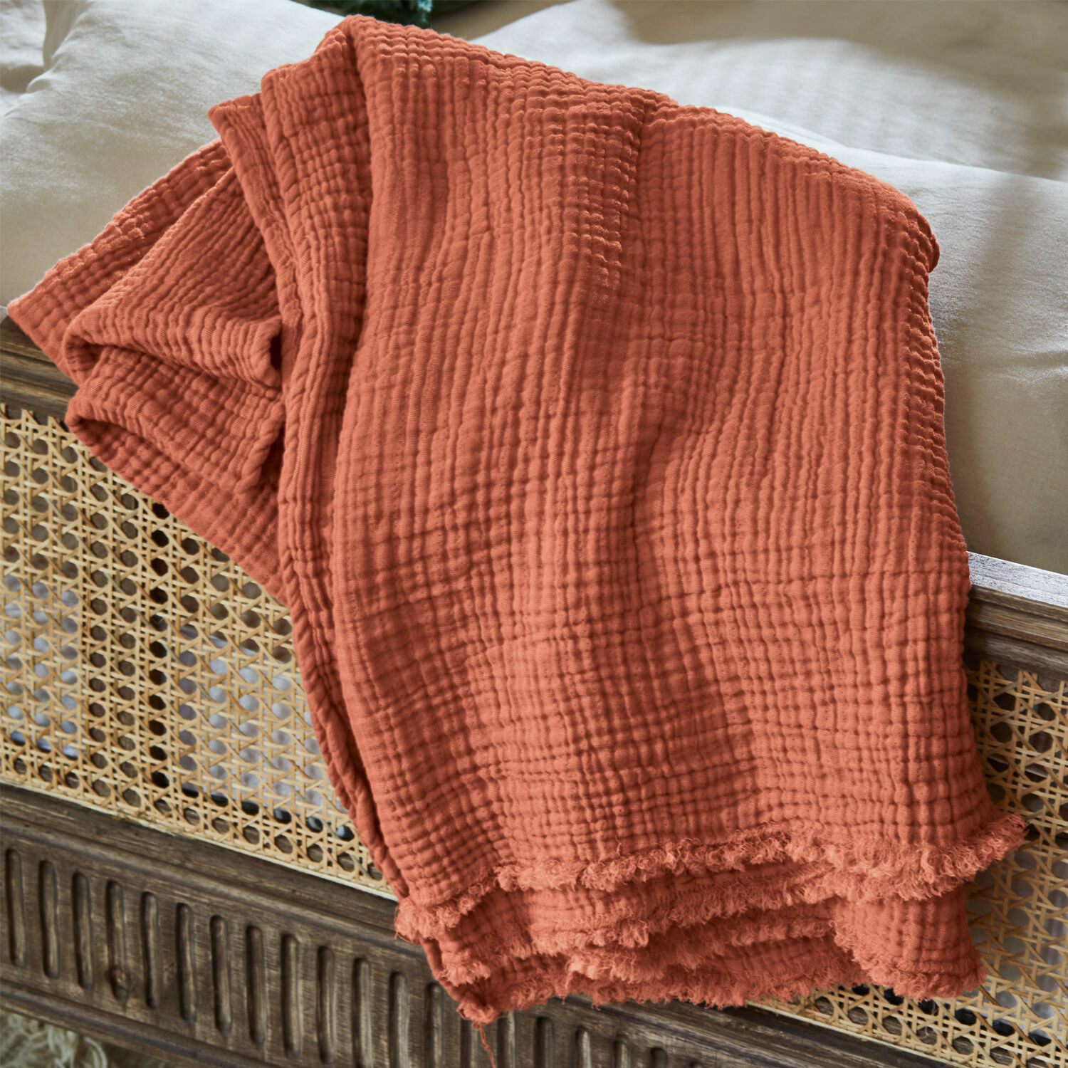 Plaid Altoona Weiche orangefarbene Baumwolldecke mit strukturierter Oberfläche, ideal für gemütliche Wohnakzente