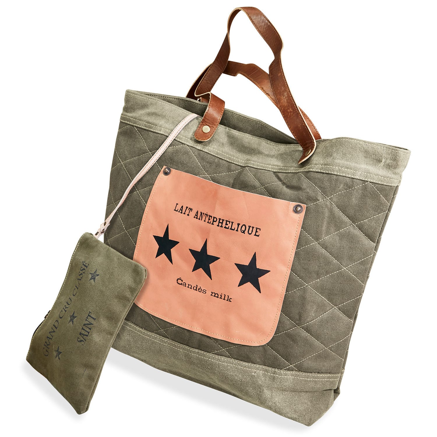 Shopper-Tasche aus grünem Canvas mit braunen Ledergriffen und rosa Tasche mit schwarzen Sternen