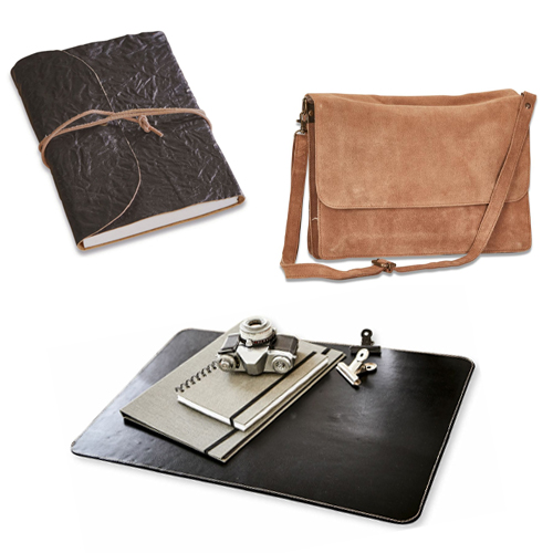 Set aus Leder-Büroaccessoires: schwarzes Notizbuch, braune Tasche und schwarze Schreibtischunterlage