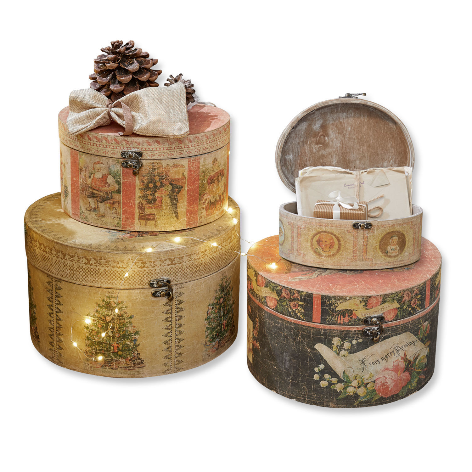 Set runder Dekorationsboxen mit Weihnachtsmotiven und LED-Lichterkette als Geschenkverpackung