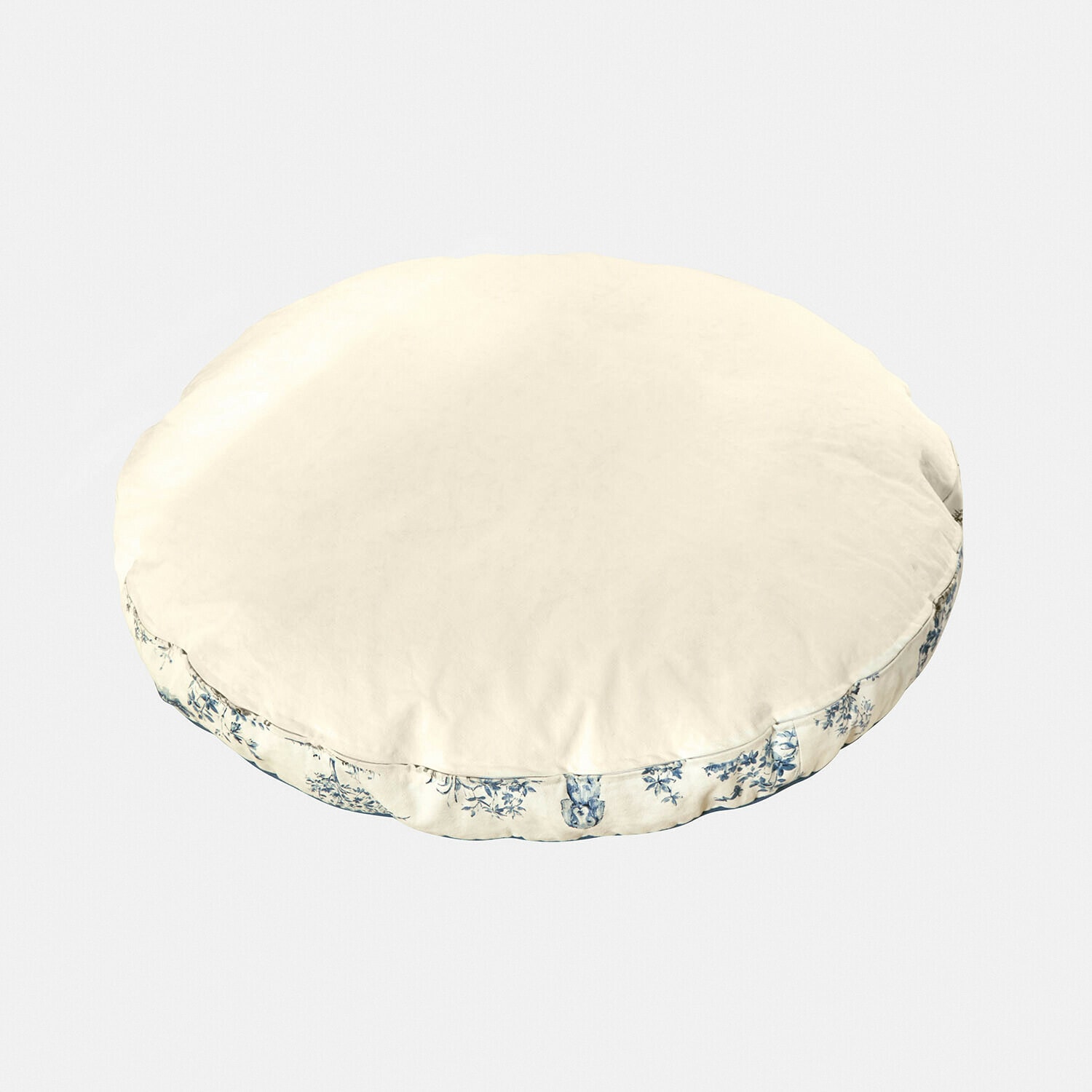 Rundes Dekokissen aus Baumwolle in Creme mit blauem Blumenmuster an den Seiten