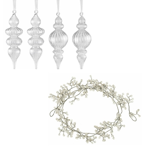 Set aus transparenten Glas-Weihnachtsanhängern und zartem Dekokranz für festliche Stimmung