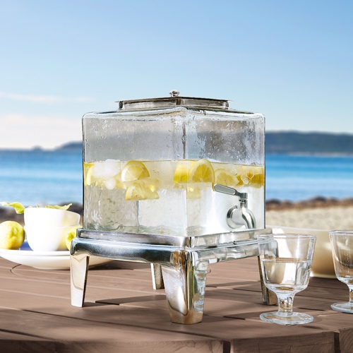 Glasgetränkespender mit Metallgestell, gefüllt mit Zitronenwasser, ideal für Sommerfeste