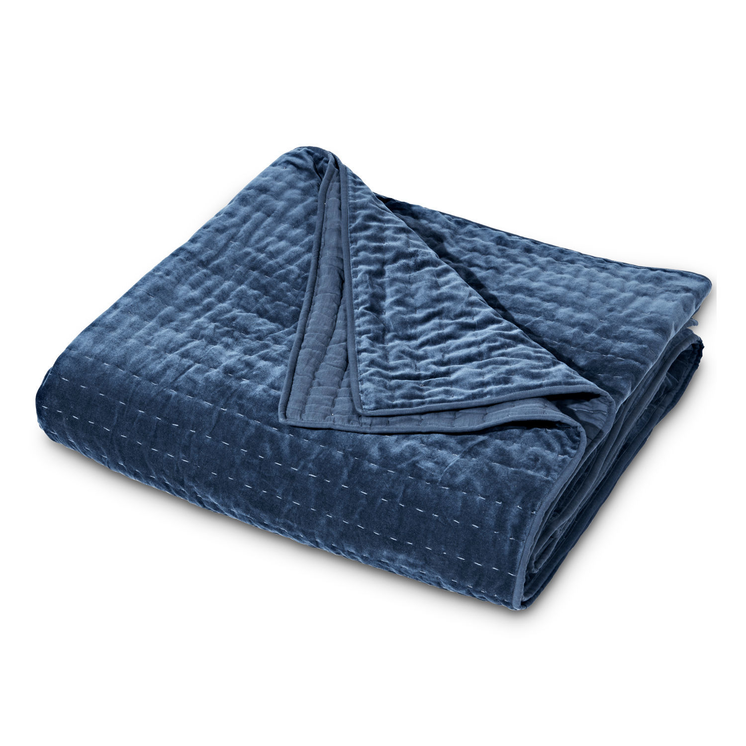 Dunkelblauer, gesteppter Kuscheldecke aus weichem Material für gemütliche Wohnräume
