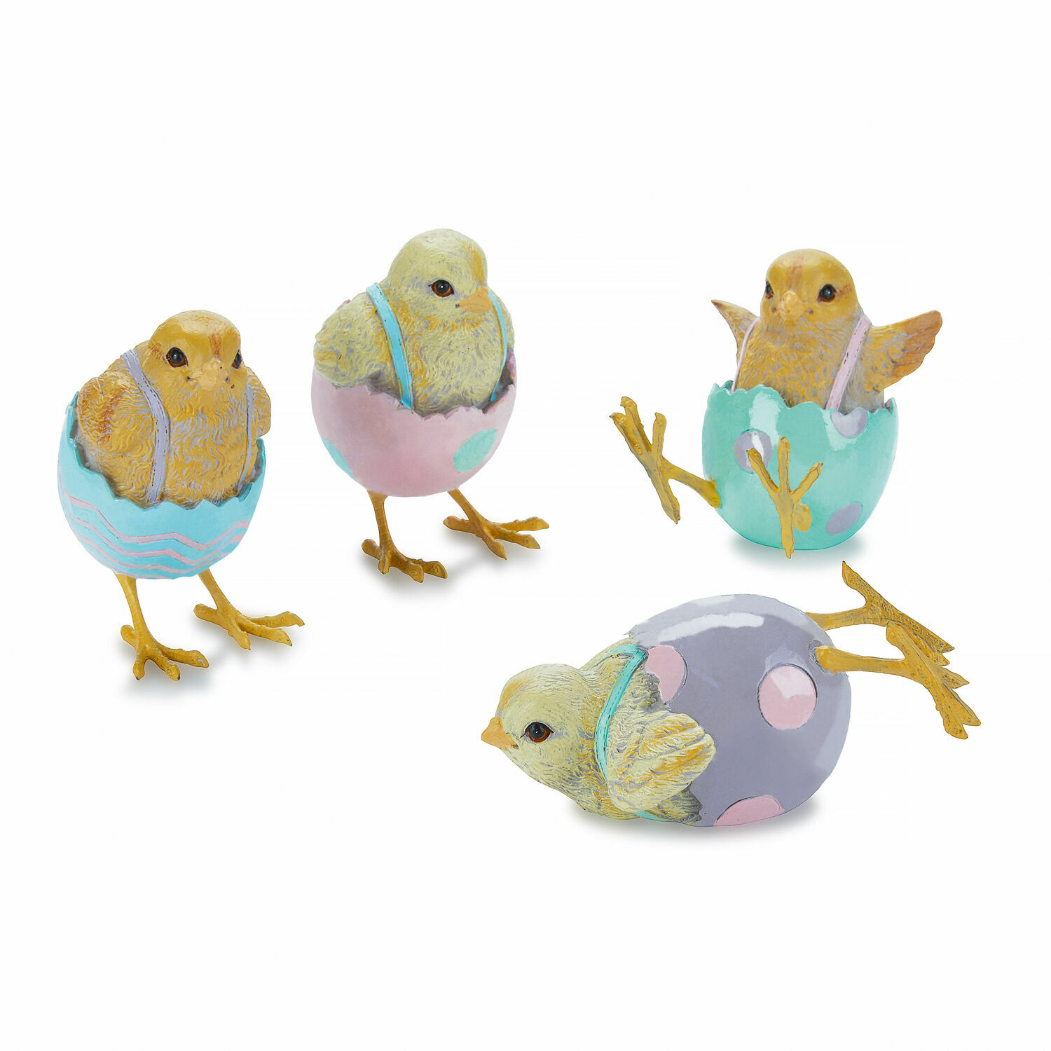 Set aus vier dekorativen Küken in pastellfarbenen Eierschalen als Osterdeko