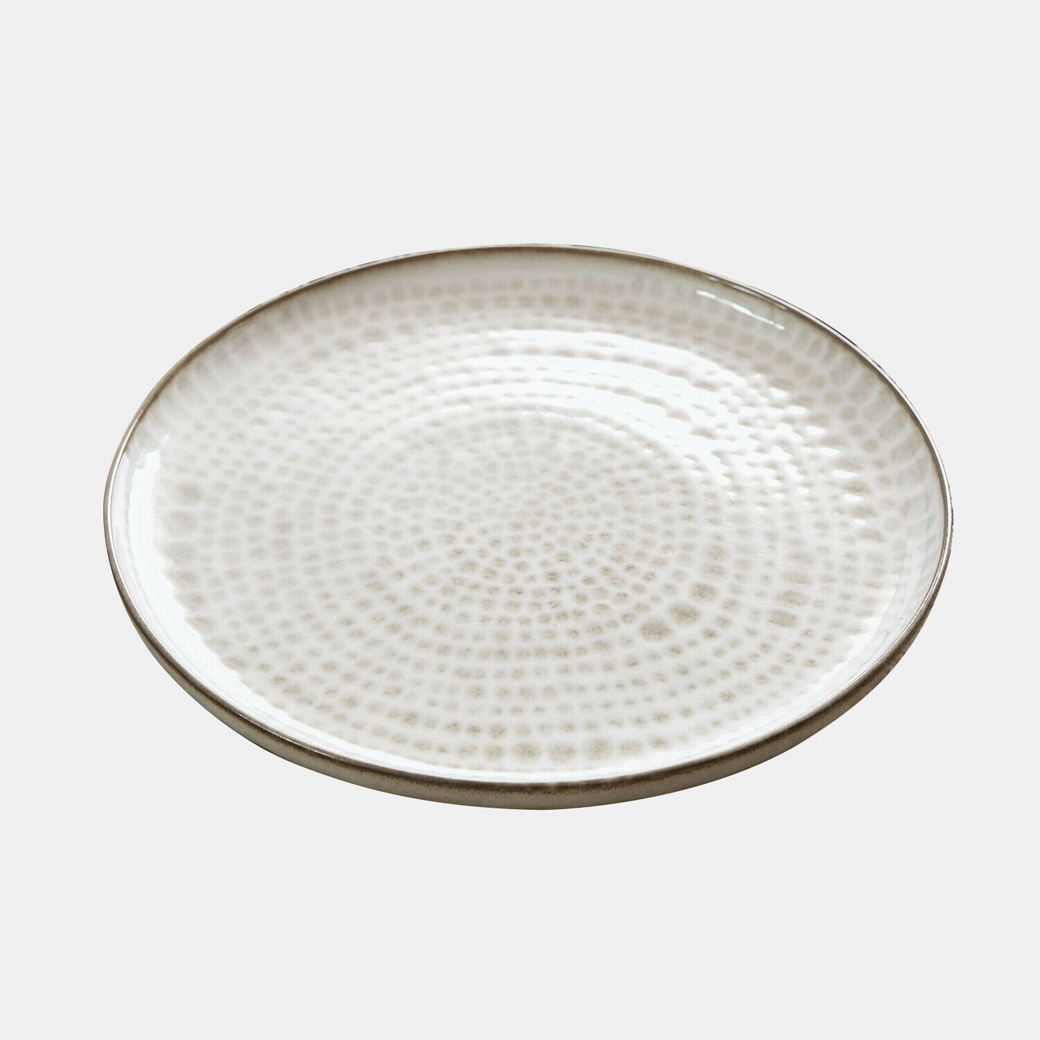 Runder Keramikteller in Creme mit feinem Muster, ideal zum stilvollen Servieren von Speisen