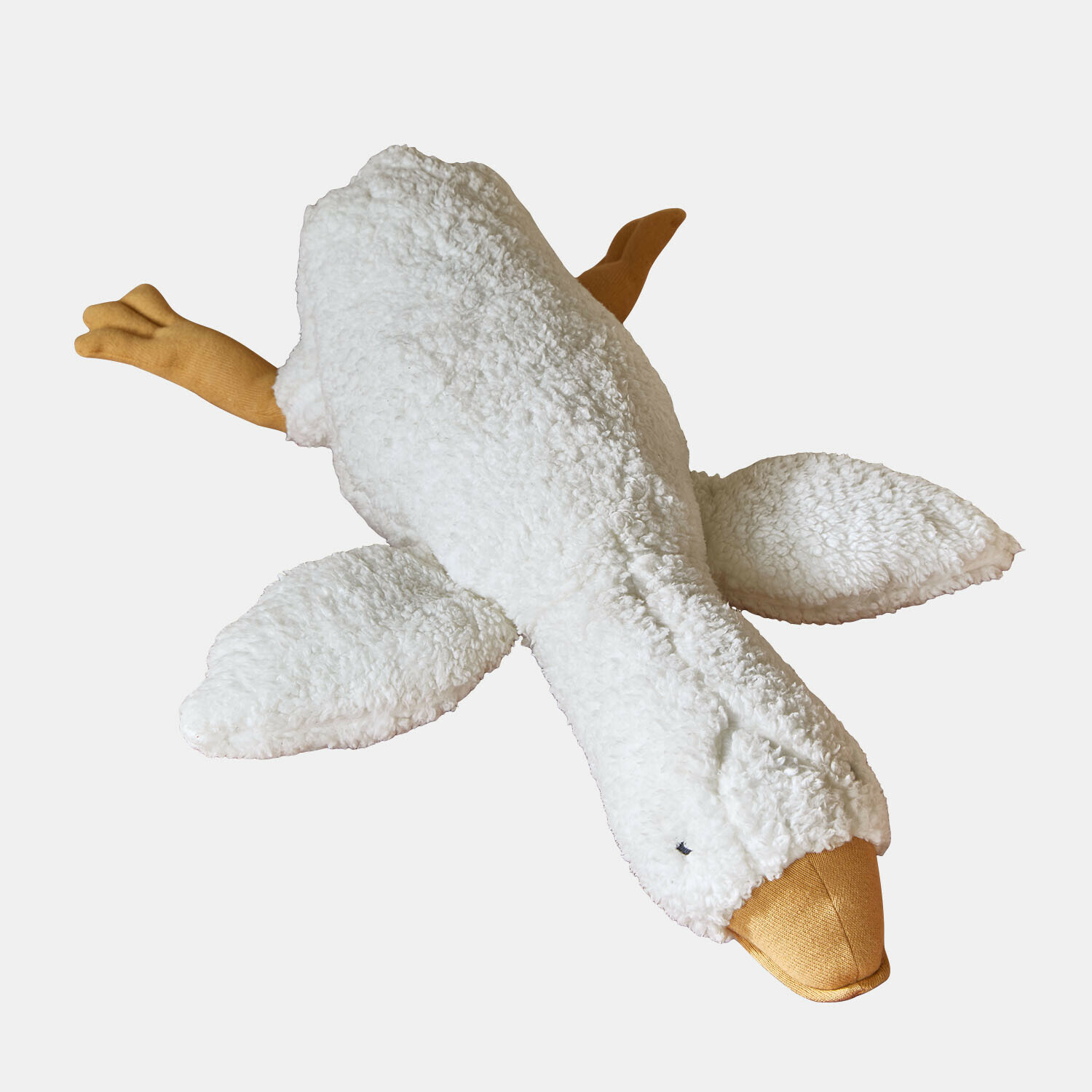 Weiche Plüschgans mit weißem Fell und orangefarbenem Schnabel sowie Beinen, kuschelig