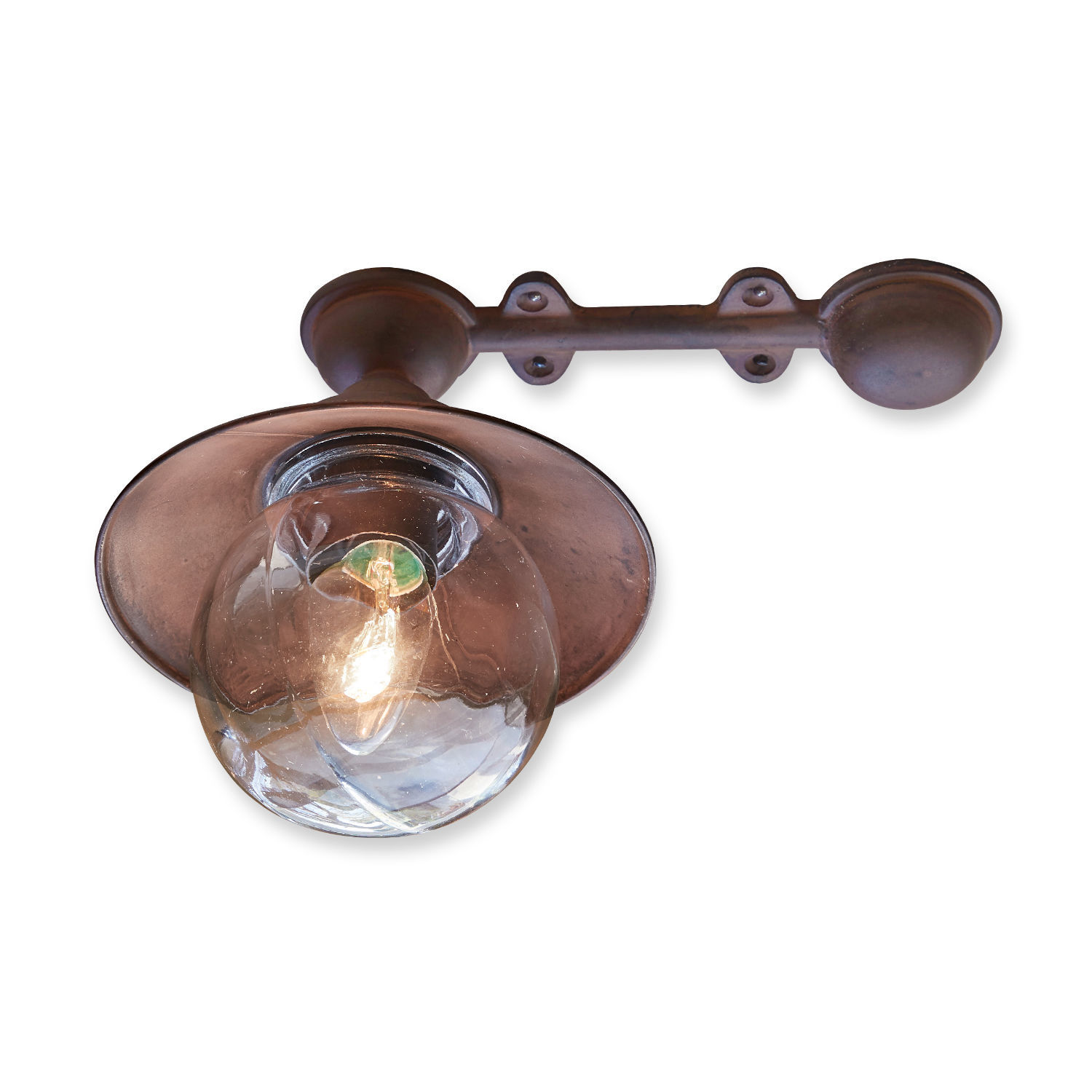 Kupferfarbige Messing-Wandleuchte mit klarem Glasball und leuchtender LED-Glühbirne