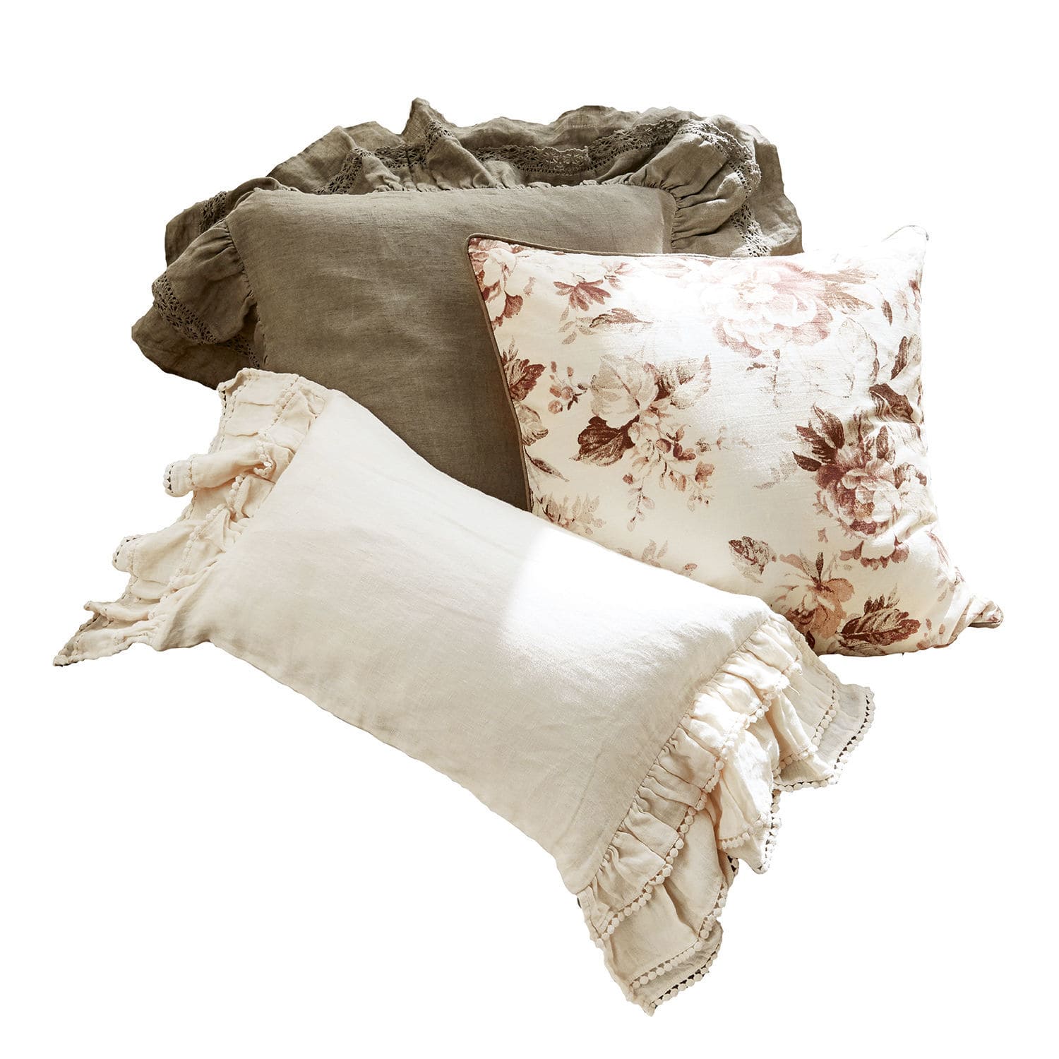 Drei dekorative Leinenkissen in Beige- und Brauntönen mit floralem Muster für gemütliches Wohnen