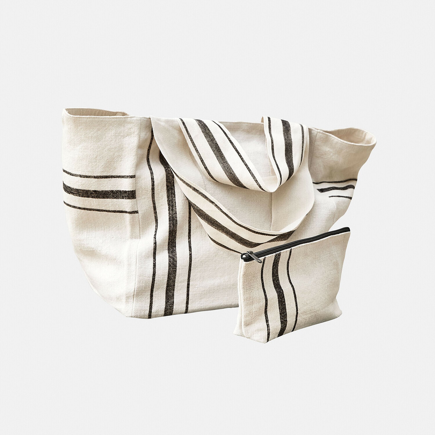 Beige Baumwolltasche und Kosmetiktasche mit schwarzen Streifen, praktisches Set für Einkäufe und Reisen
