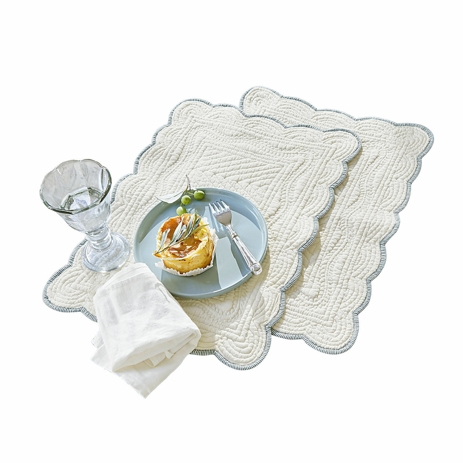 Platzset 2er Set Fontienne Set aus zwei cremefarbenen Baumwoll-Tischsets mit dekorativer Steppung und grauem Rand