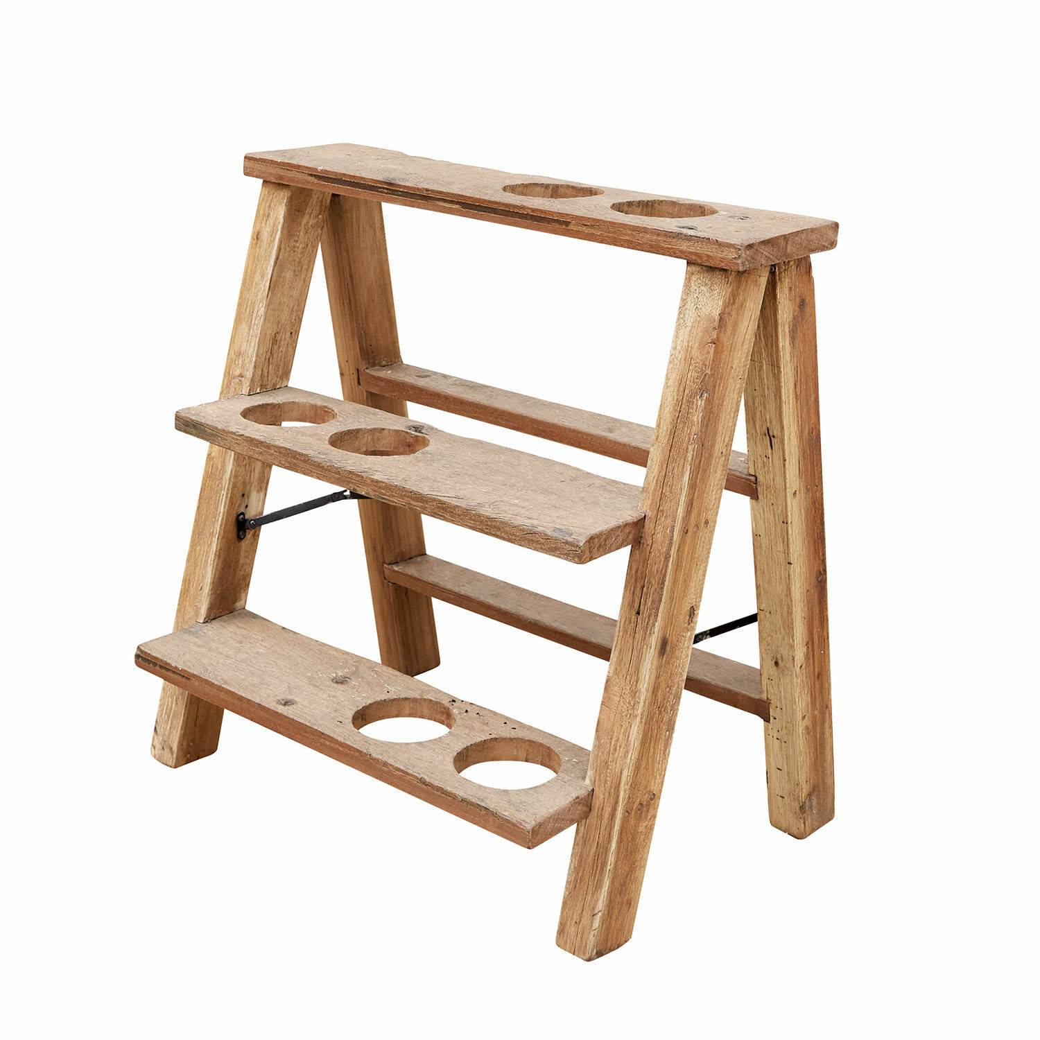 Rustikales Holzregal mit runden Aussparungen für Blumentöpfe in natürlicher Holzfarbe