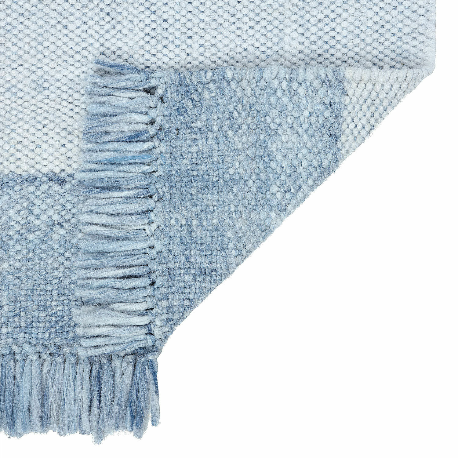 Blauer Wollplaid mit Fransen und weicher Struktur, ideal für Wohnraumdekoration und Gemütlichkeit