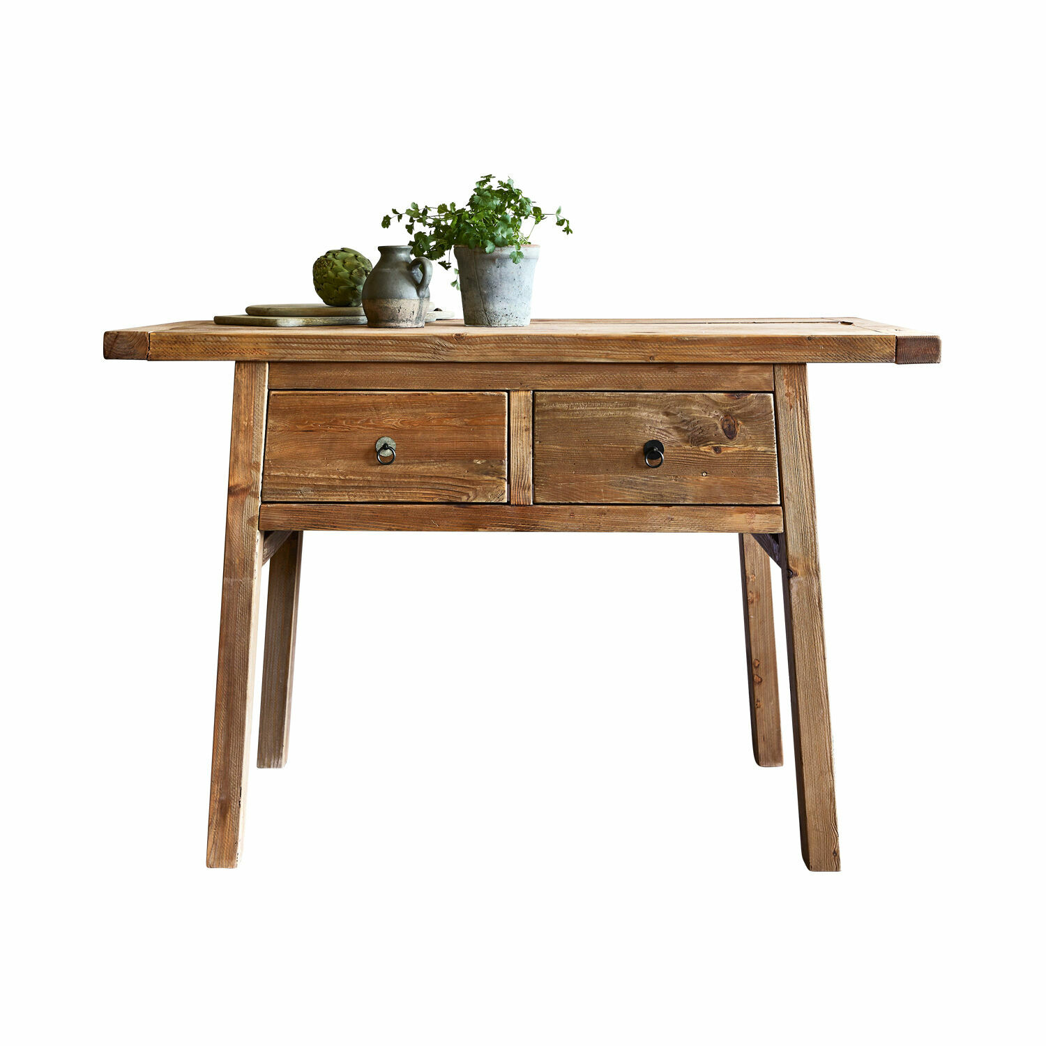 Rustikaler Schreibtisch aus Holz mit zwei Schubladen und Pflanzen-Deko, naturfarben