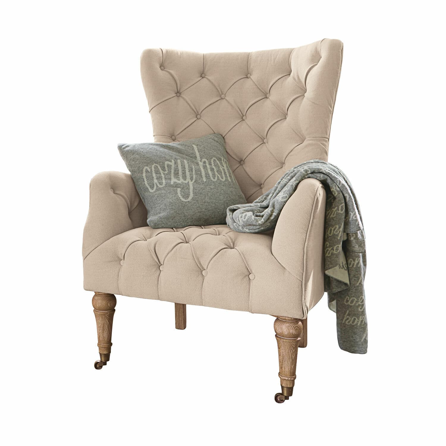 Sessel Migré Beiger, gepolsterter Sessel mit Holzbeinen, grauem Kissen und Decke cozy home