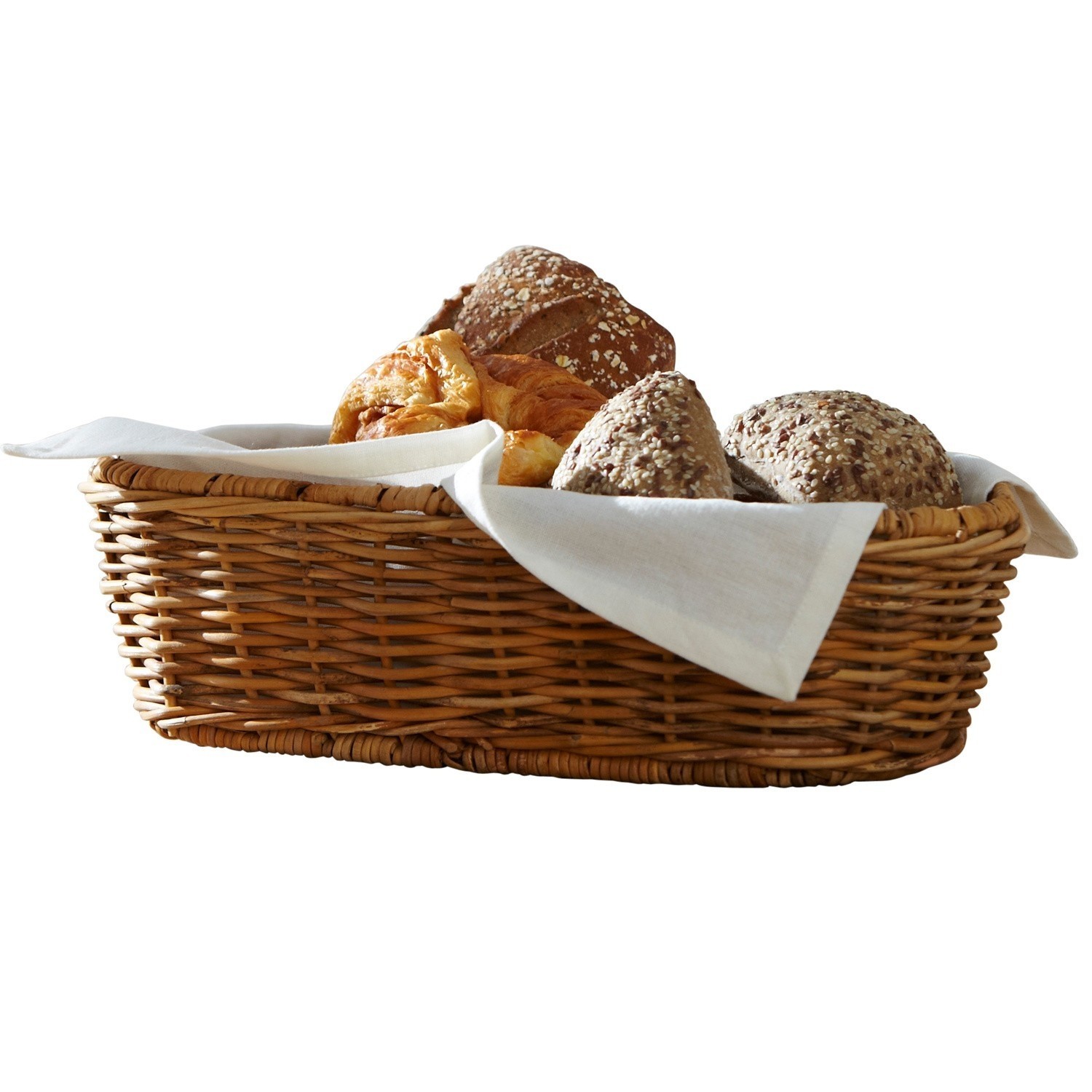 Wikingerkorb mit weißem Tuch und verschiedenen Brotsorten für das Frühstück