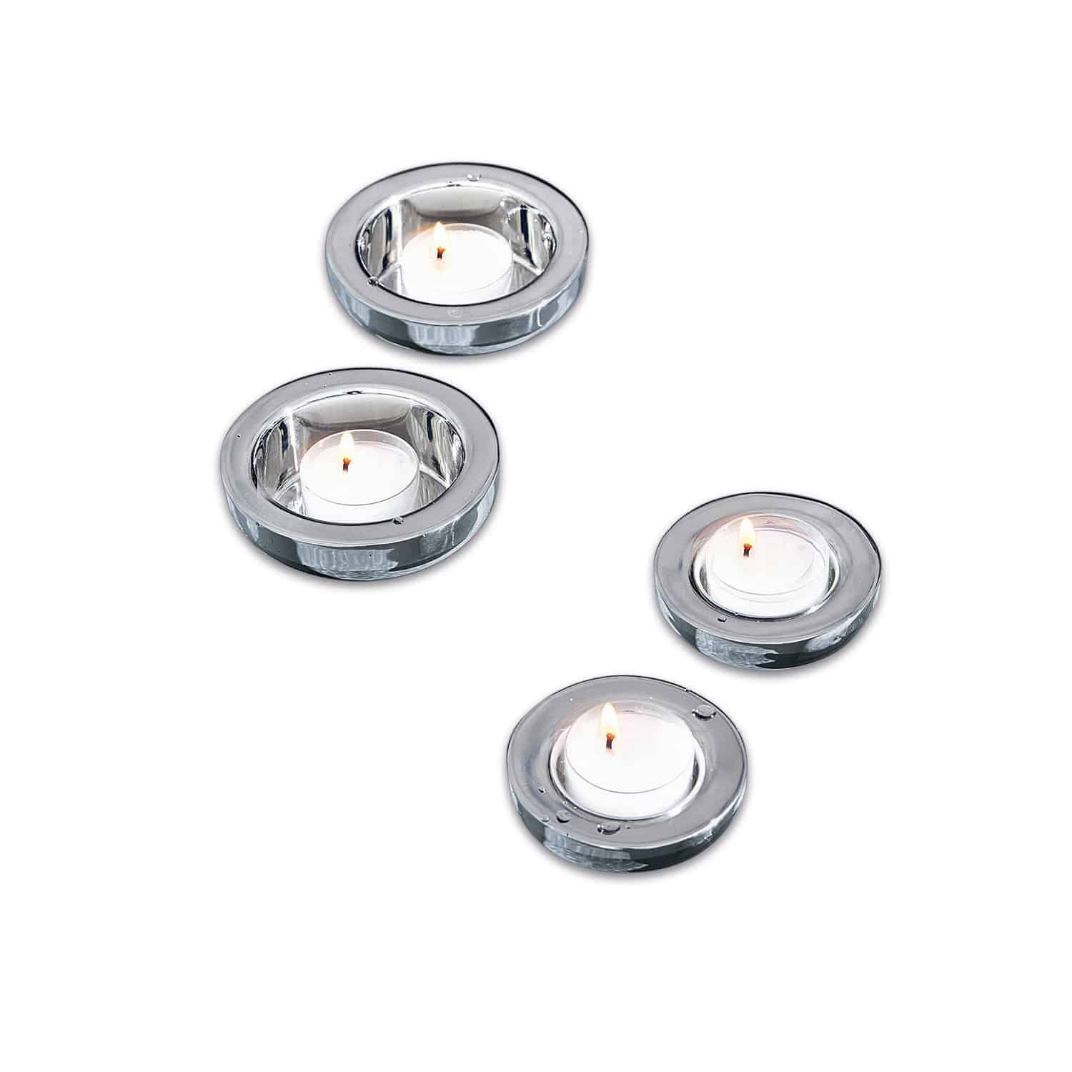 Set aus vier transparenten Glas-Teelichthaltern mit modernem Design für Teelichter
