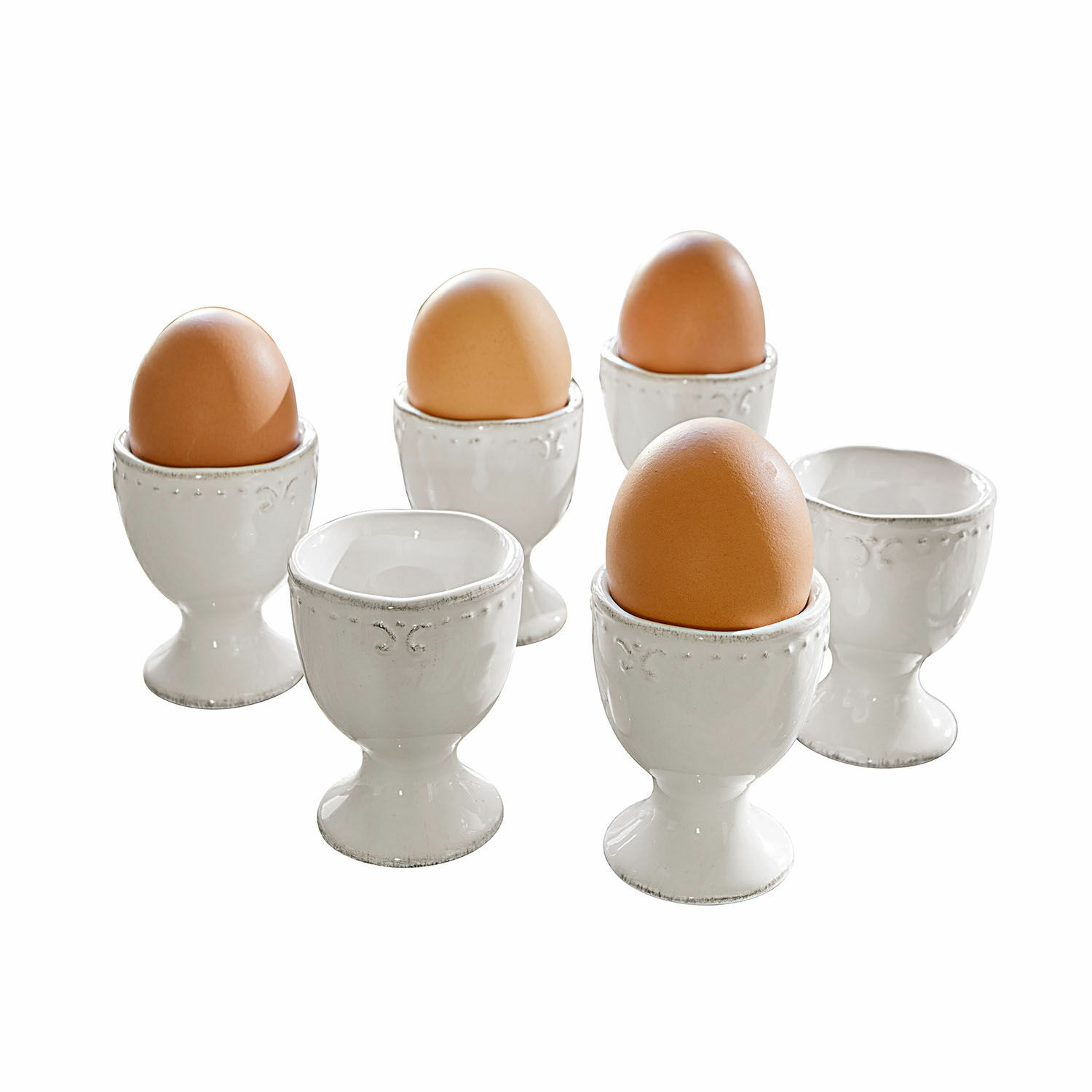 Eierbecher 6er Set Fontienne Set aus weißen Keramik-Eierbechern mit braunen Eiern, klassisches Küchendesign